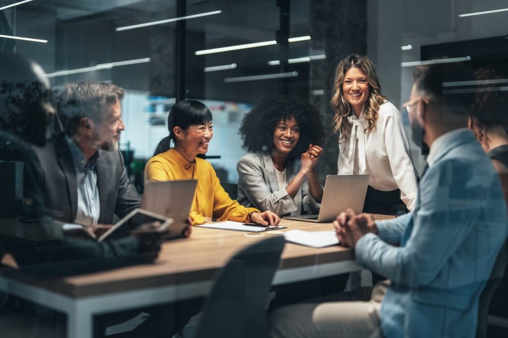 Diverse leadership team collaborating in a boardroom meeting