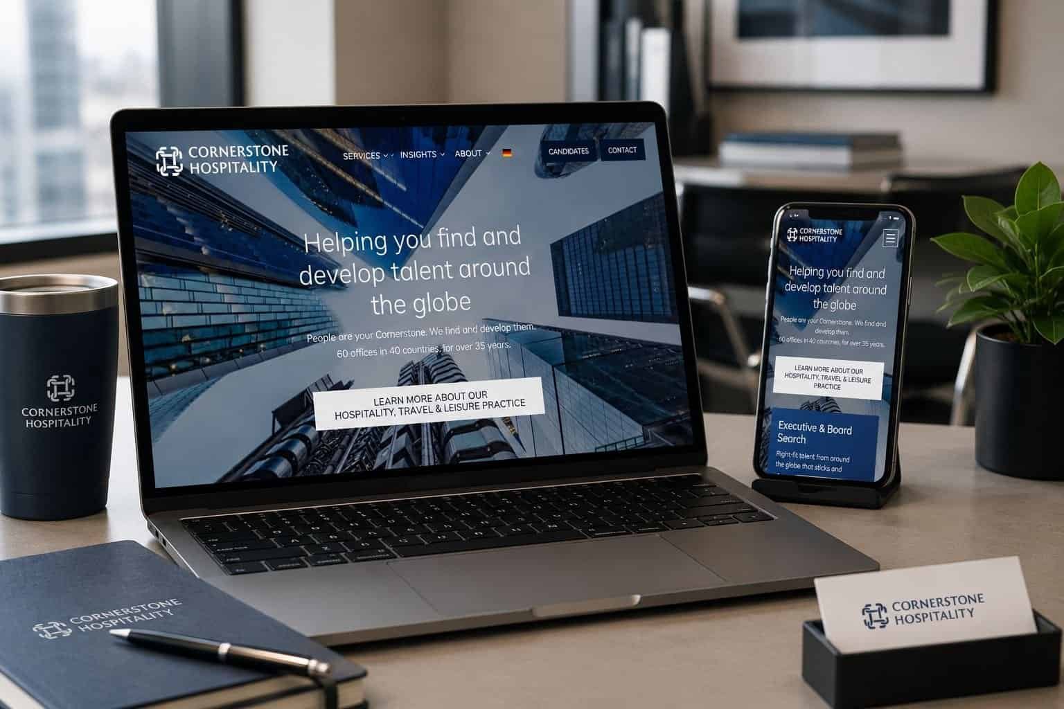 Laptop and smartphone displaying Cornerstone Hospitality website for talent development.