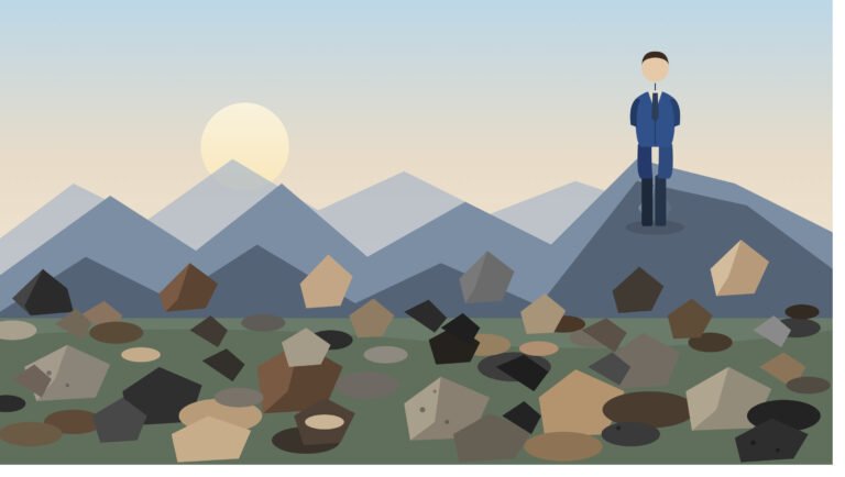 A hospitality executive stands on a mountain peak above a field of scattered rocks, representing a leader facing the obstacles of executive and board search decisions.