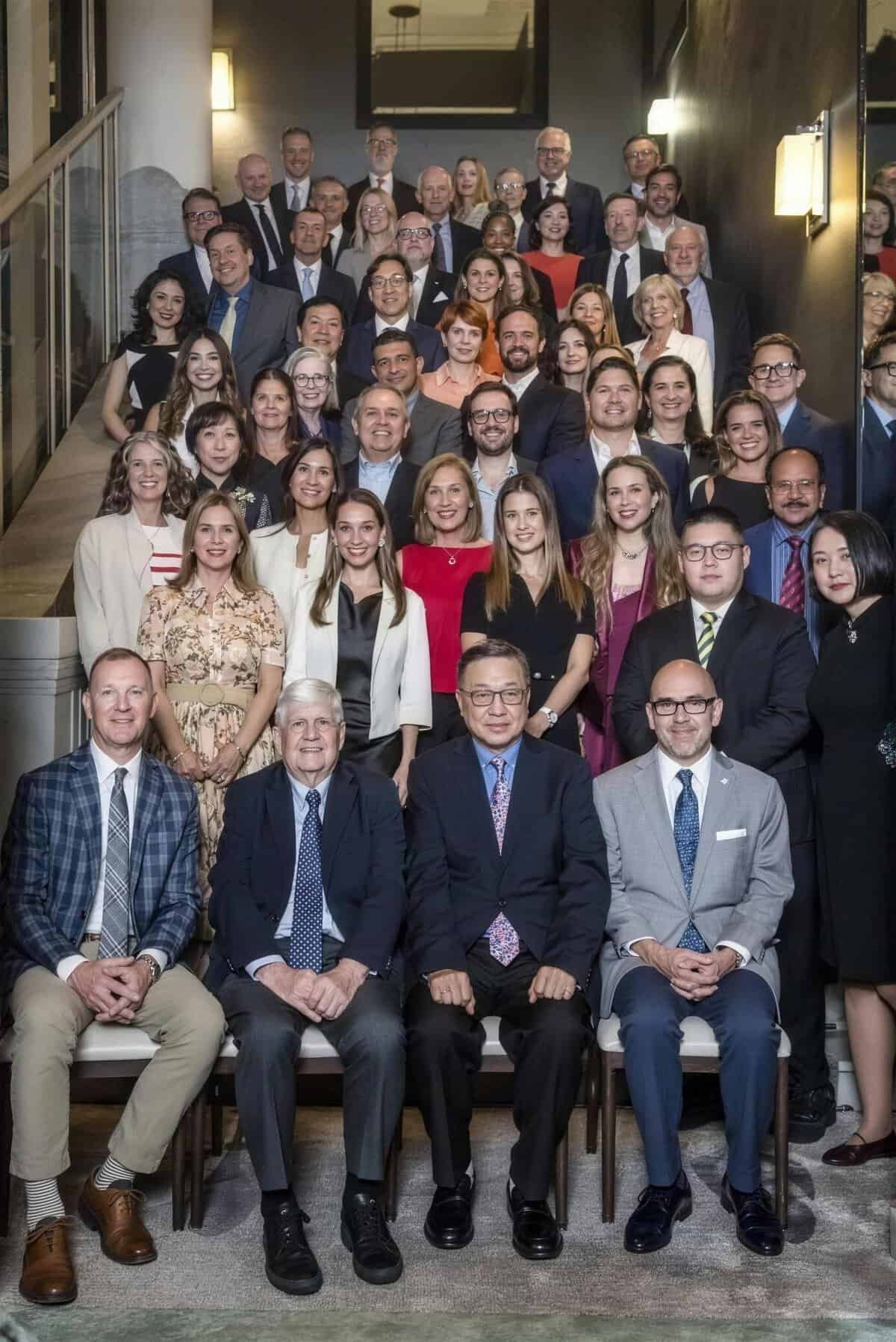 Large group of diverse professionals at Cornerstone Hospitality event.