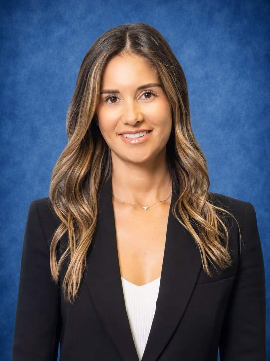 Professional woman in business attire for Cornerstone Hospitality.